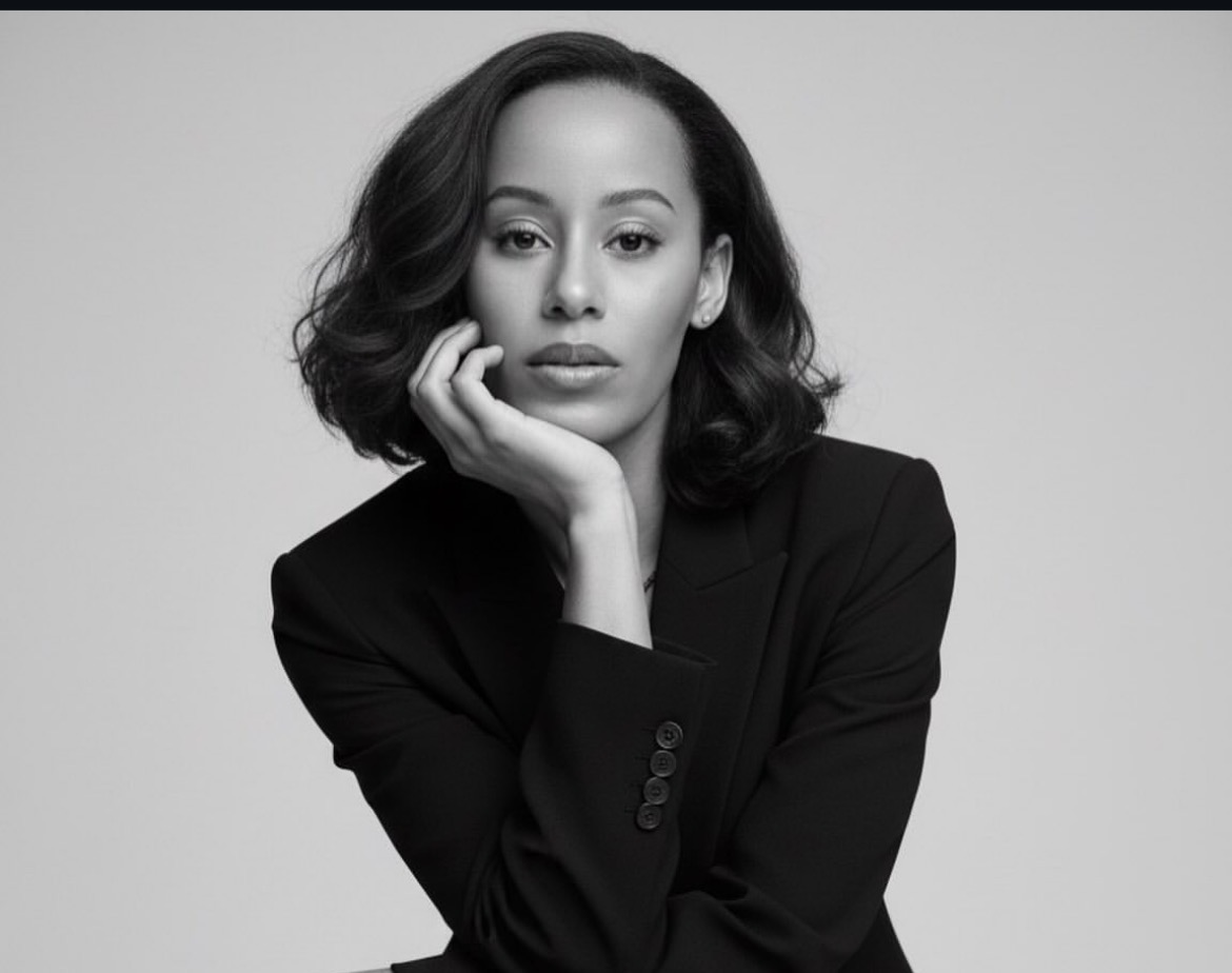 Black and white portrait of Jazmin Alvarez in a black blazer